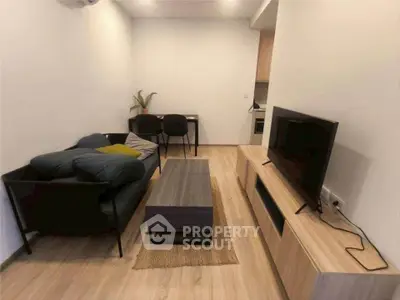 Modern living room with sleek furniture and minimalist design, perfect for urban living.