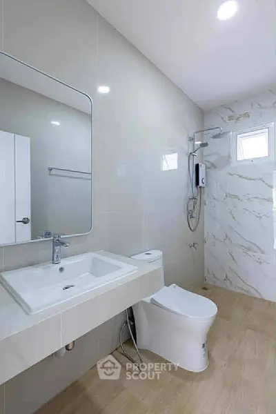 Modern bathroom with sleek fixtures and elegant tile design