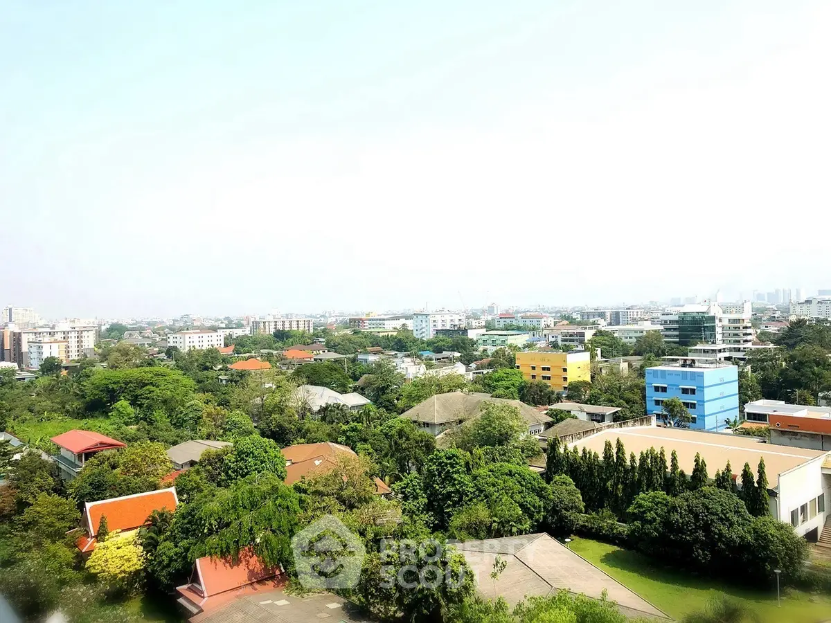Stunning panoramic view of lush green neighborhood with vibrant buildings.