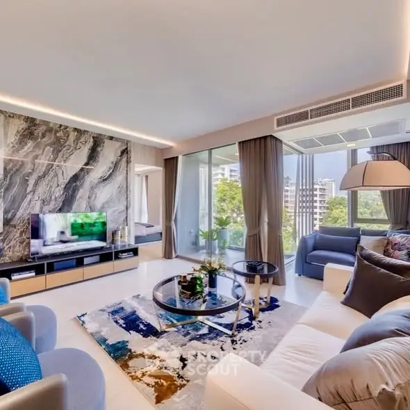 Luxurious modern living room with stunning city view and elegant decor.