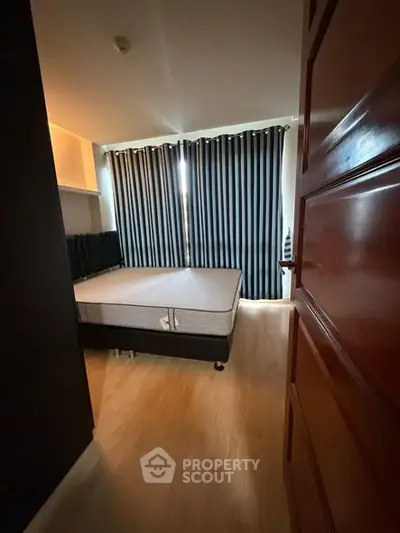 Cozy bedroom with modern decor and natural light