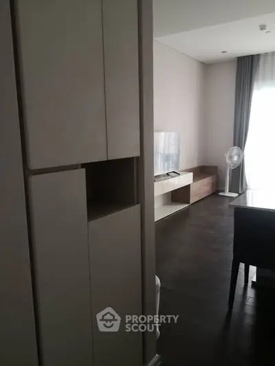 Modern living room with sleek furniture and natural light