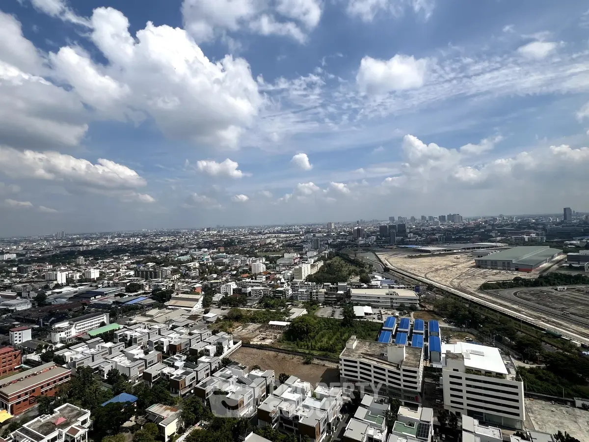 Stunning panoramic cityscape view from high-rise building balcony