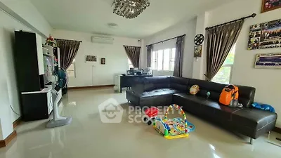 Spacious living room with modern decor and large sectional sofa
