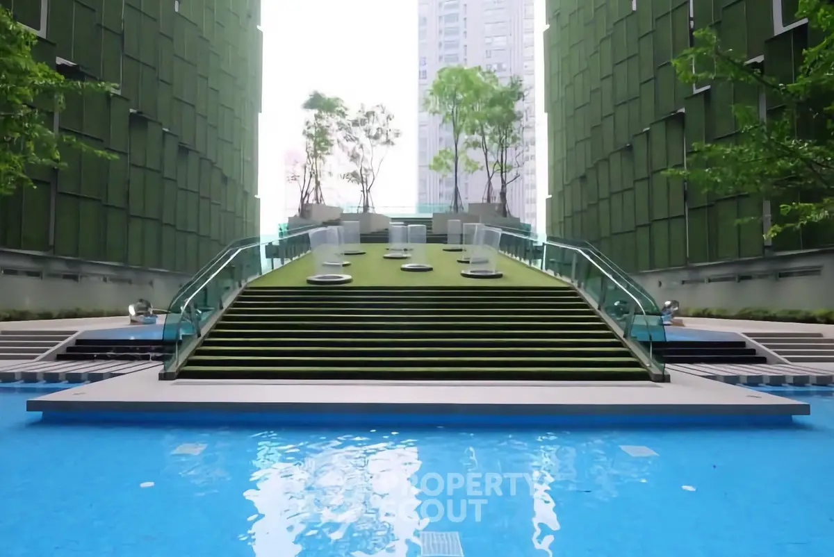 Luxurious modern building with stunning rooftop garden and pool area