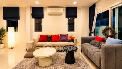 Stylish living room with modern furniture and cozy ambiance, perfect for relaxation and entertaining.