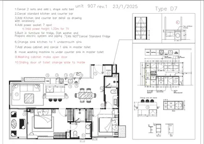 Detailed floor plan of unit 907 with furniture layout and kitchen specifications.
