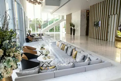 Luxurious modern living room with elegant decor and spacious seating area