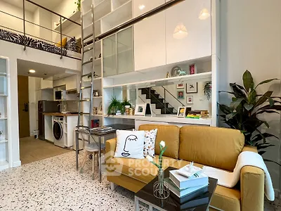 Modern loft apartment with stylish living area and mezzanine level