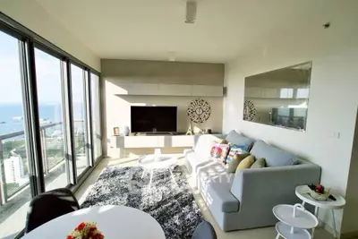 Luxurious living room with stunning ocean view and modern decor