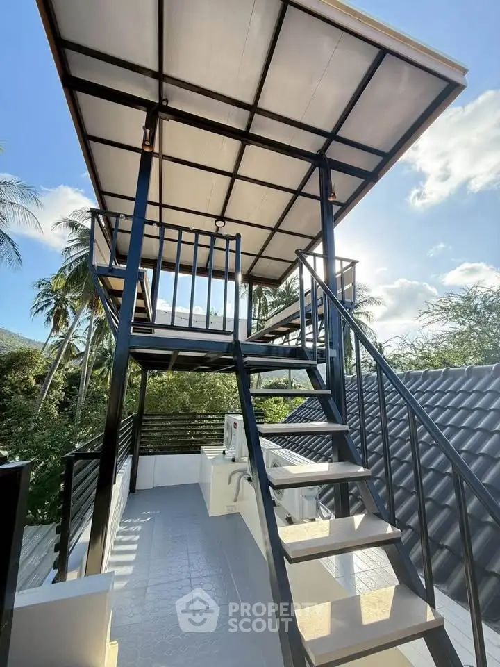Stunning rooftop terrace with modern design and scenic views, perfect for relaxation and entertainment.