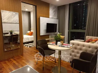 Luxurious modern living room with elegant decor and cozy seating area, perfect for relaxation and entertainment.