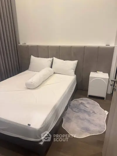 Cozy bedroom with modern design and plush bedding