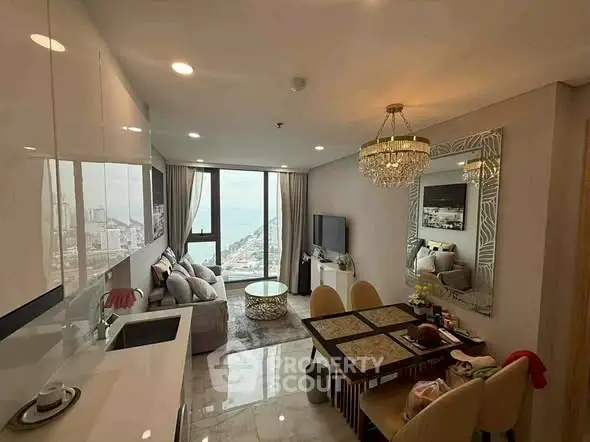 Luxurious living room with stunning ocean view and elegant decor