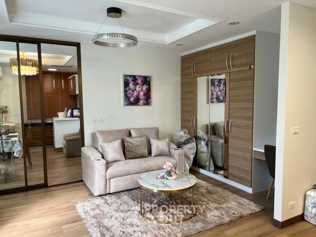 Elegant living room with modern decor and cozy seating area