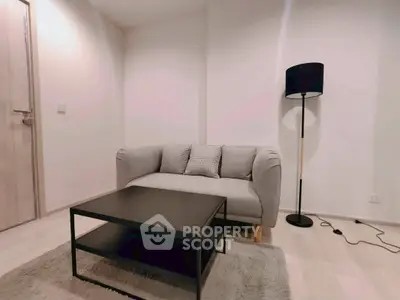 Cozy living room with modern sofa and stylish floor lamp