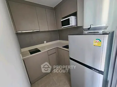 Modern kitchen with sleek cabinets and stainless steel appliances