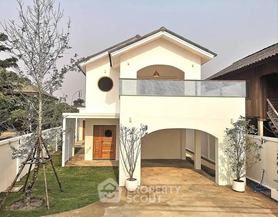 Charming two-story house with modern architecture and spacious driveway