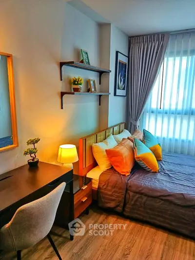 Cozy modern bedroom with stylish decor and natural light