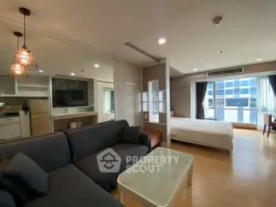 Spacious modern studio apartment with open layout and stylish furnishings