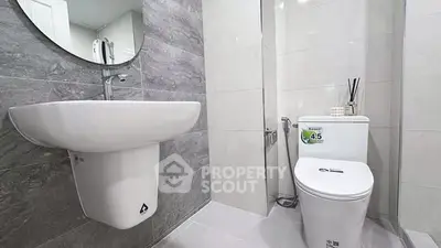 Modern bathroom with sleek design and elegant fixtures.