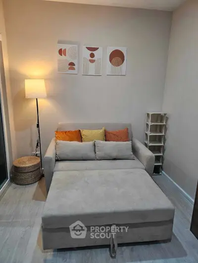 Cozy living room with modern sofa bed and stylish decor