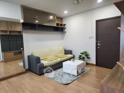Modern living room with cozy sofa and stylish decor