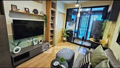 Modern living room with stylish decor and balcony view