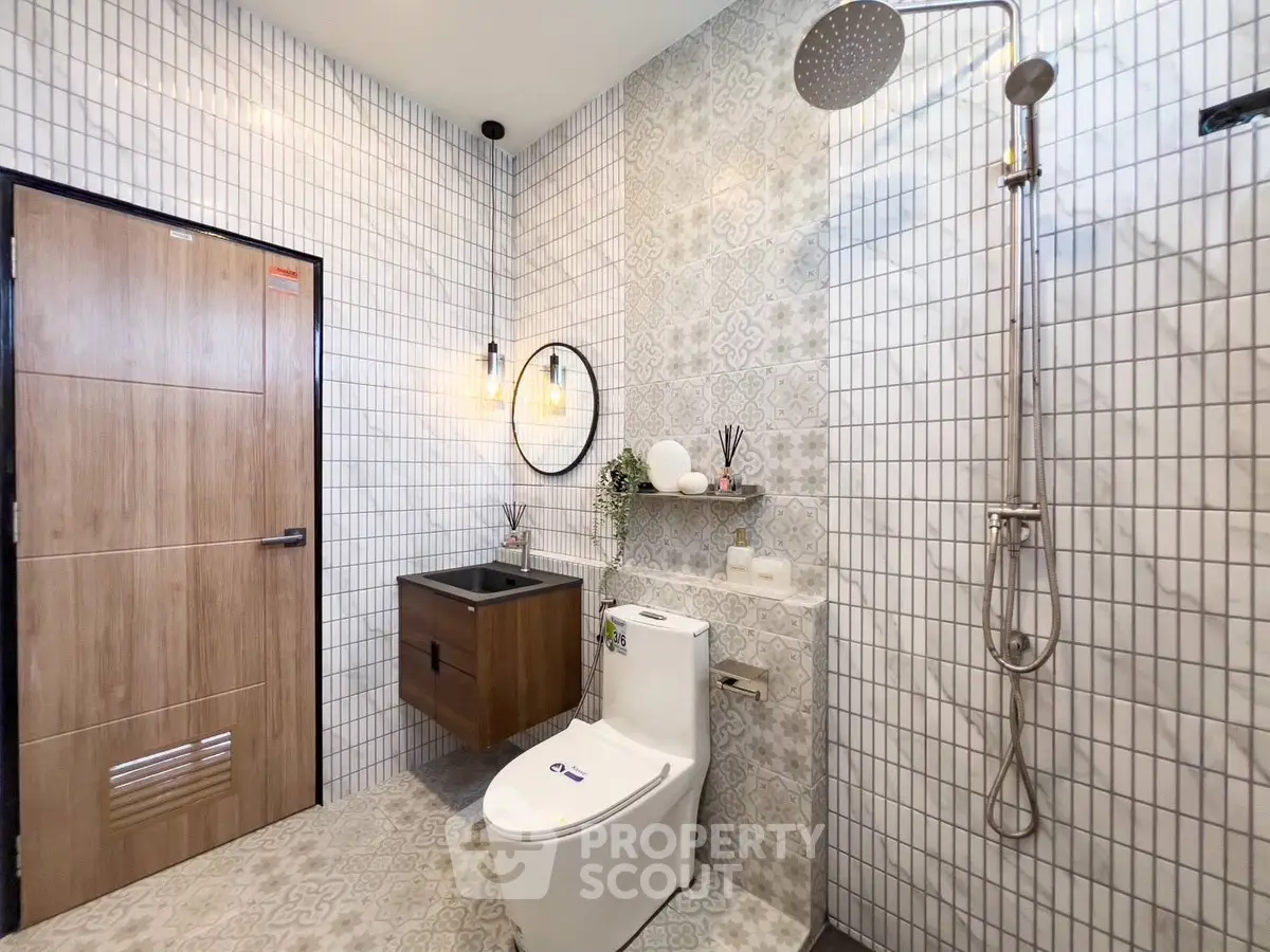 Modern bathroom with stylish tiles and sleek fixtures