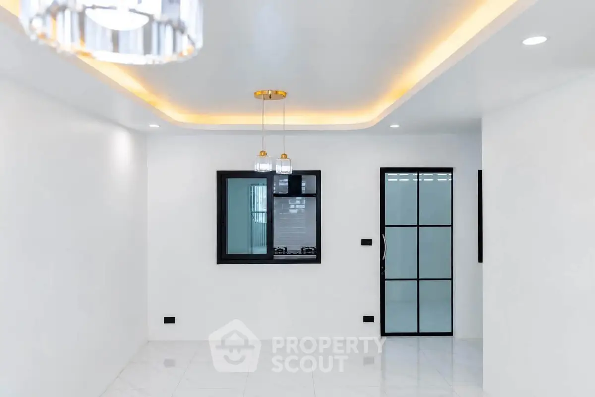 Modern minimalist interior with sleek lighting and elegant design, perfect for contemporary living.