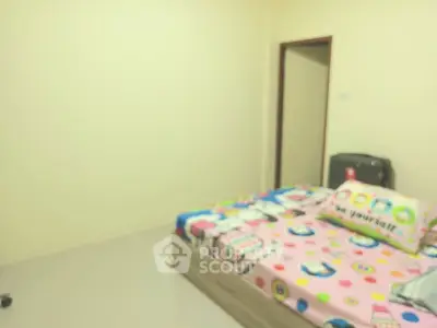 Cozy bedroom with colorful bedding and minimalistic decor