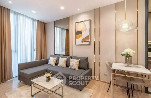Modern living room with stylish decor and cozy seating area in a contemporary apartment.