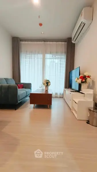Modern living room with stylish decor and natural light