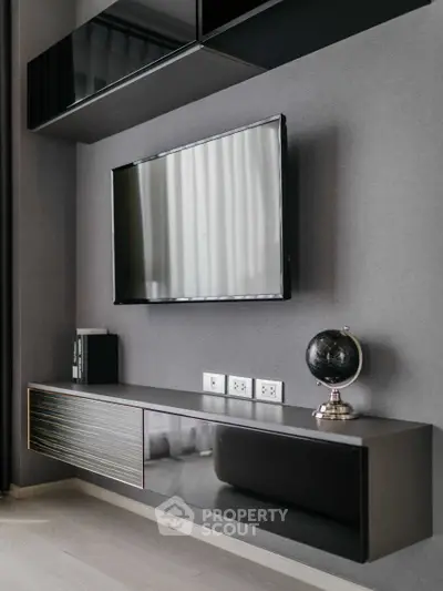 Modern living room with sleek TV unit and stylish decor