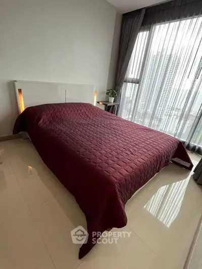 Modern bedroom with city view and elegant decor