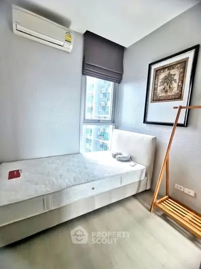 Cozy bedroom with modern decor and natural light