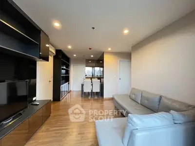 Spacious modern living room with sleek furniture and open layout