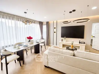 Luxurious modern living room with elegant dining area and stylish decor