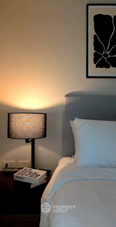 Cozy bedroom with modern decor and soft lighting