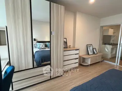 Modern bedroom with stylish wooden furniture and cozy decor