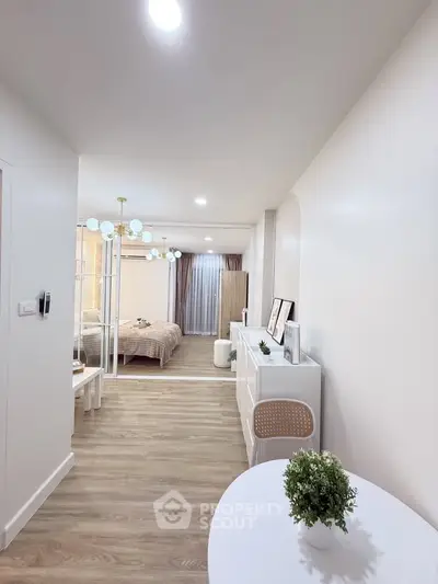 Modern open-plan apartment with stylish decor and natural light