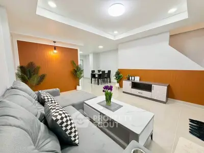 Modern living room with stylish decor and spacious seating area