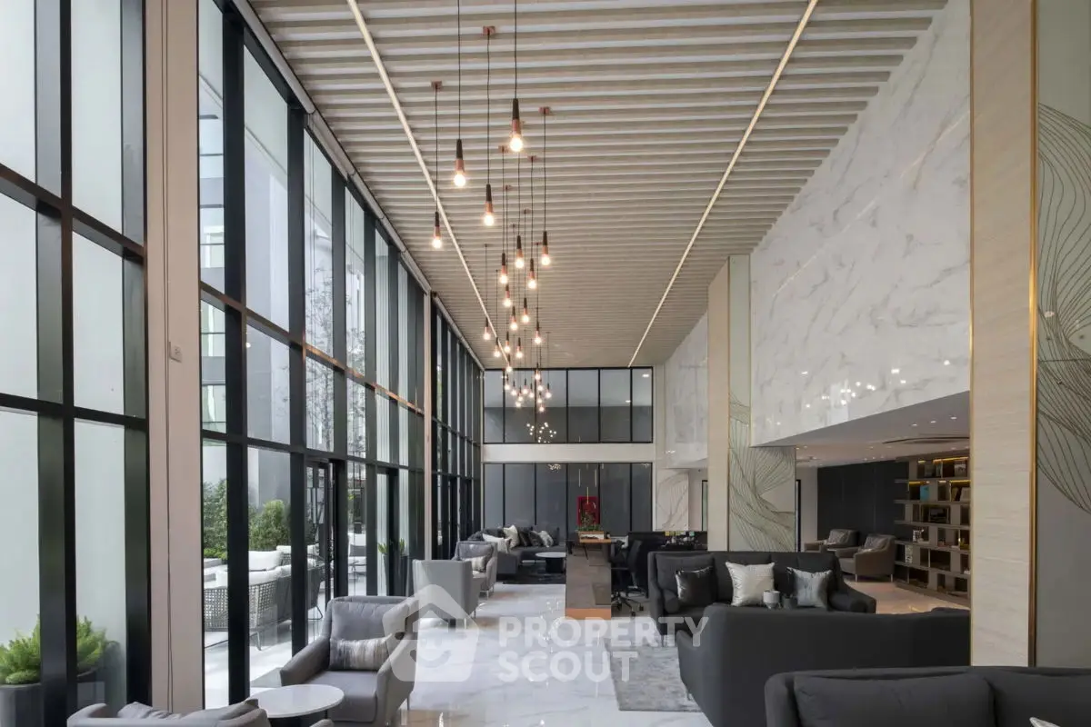 Luxurious modern living room with high ceilings and elegant lighting