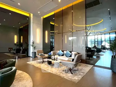 Luxurious modern living room with elegant furniture and floor-to-ceiling windows