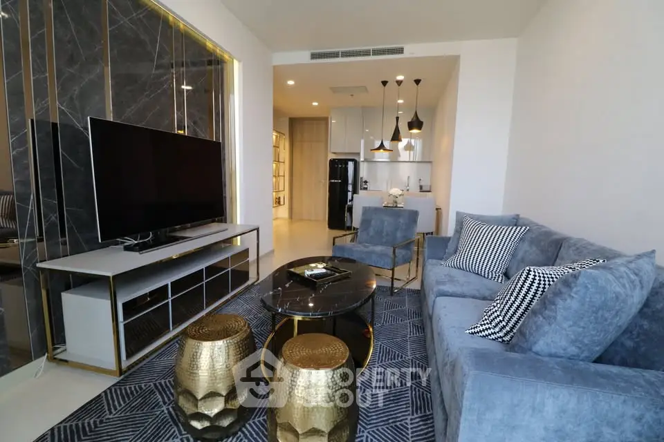 Luxurious modern living room with stylish decor and open kitchen layout