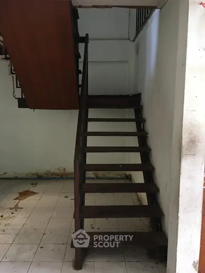 Rustic wooden staircase in a vintage home interior