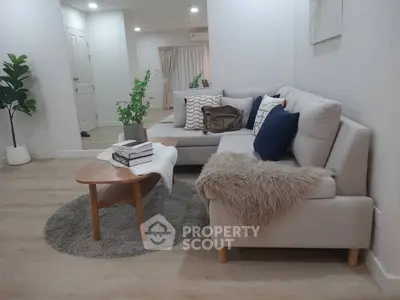 Modern living room with cozy sectional sofa and stylish decor