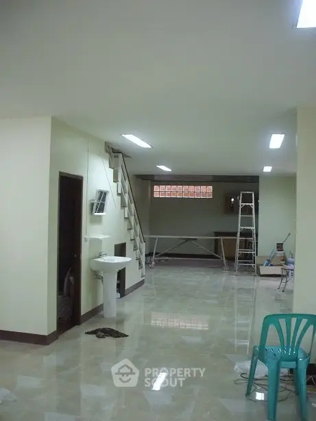 Spacious interior with loft and modern finishes, ideal for creative living spaces.