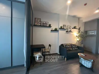 Modern living room with stylish decor and cozy seating area.