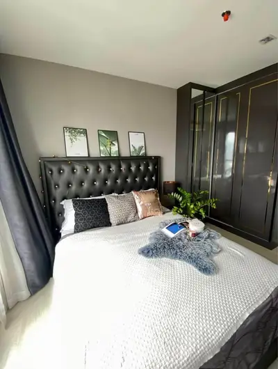 Luxurious bedroom with elegant decor and large wardrobe, perfect for modern living.